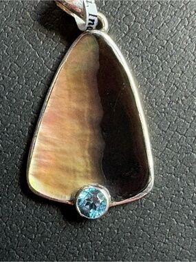 Iridescent Pink-Green Shell Pendant with Blue Topaz Accent